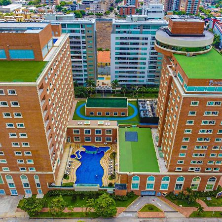 Hotel Dann Carlton Barranquilla Y Centro De Convenciones Eksteriør bilde Aerial view of the complex