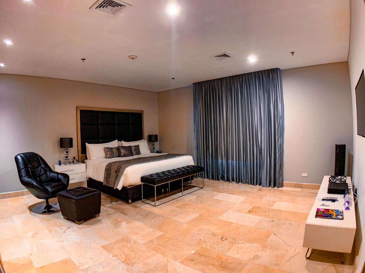 Hotel Dann Carlton Barranquilla Y Centro De Convenciones Eksteriør bilde A bedroom at the hotel